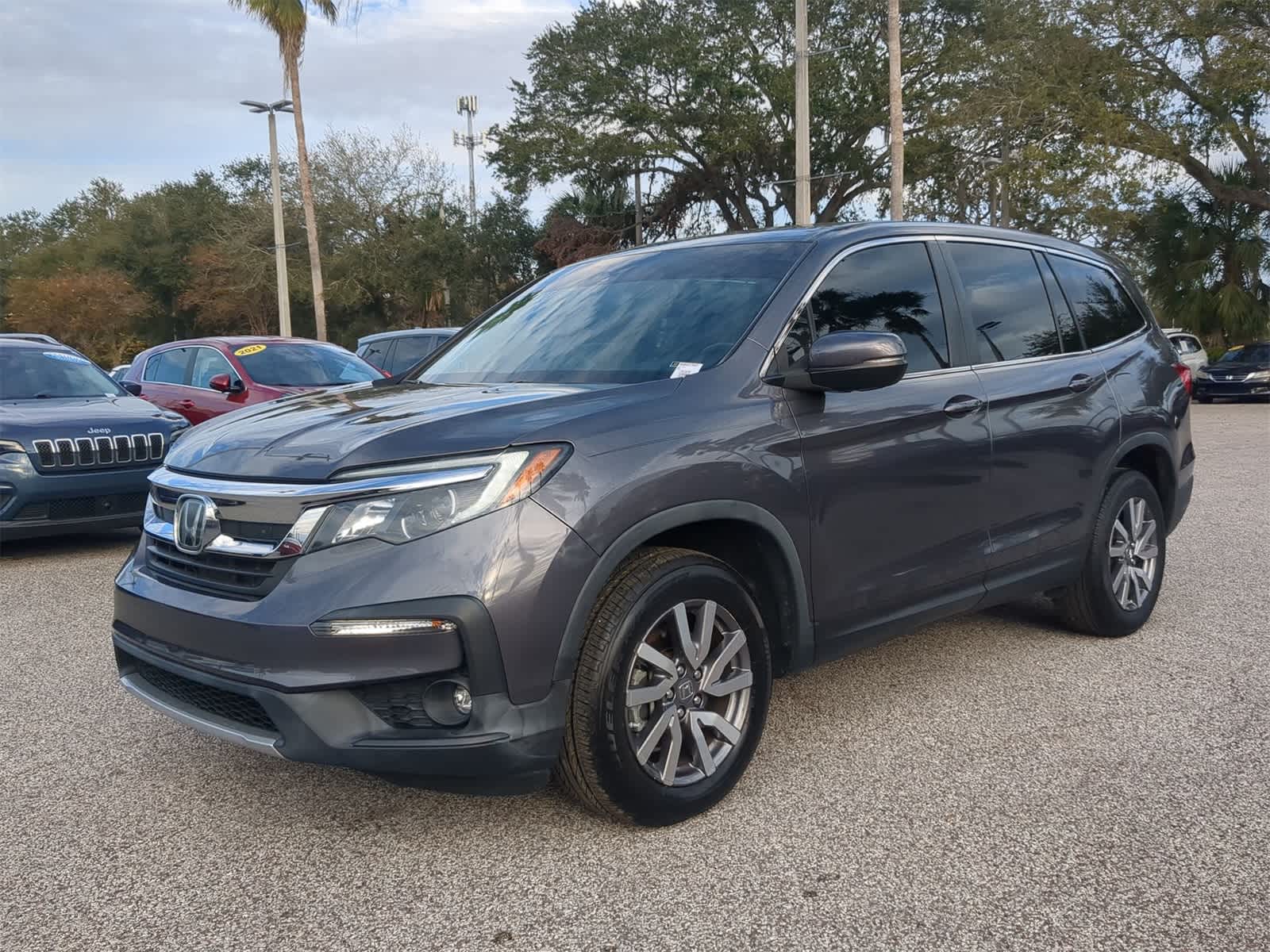 Used 2021 Honda Pilot EX-L with VIN 5FNYF5H53MB047562 for sale in Tampa, FL