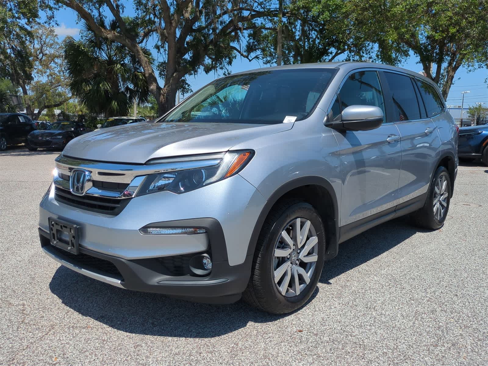Used 2021 Honda Pilot EX-L with VIN 5FNYF5H53MB047626 for sale in Tampa, FL
