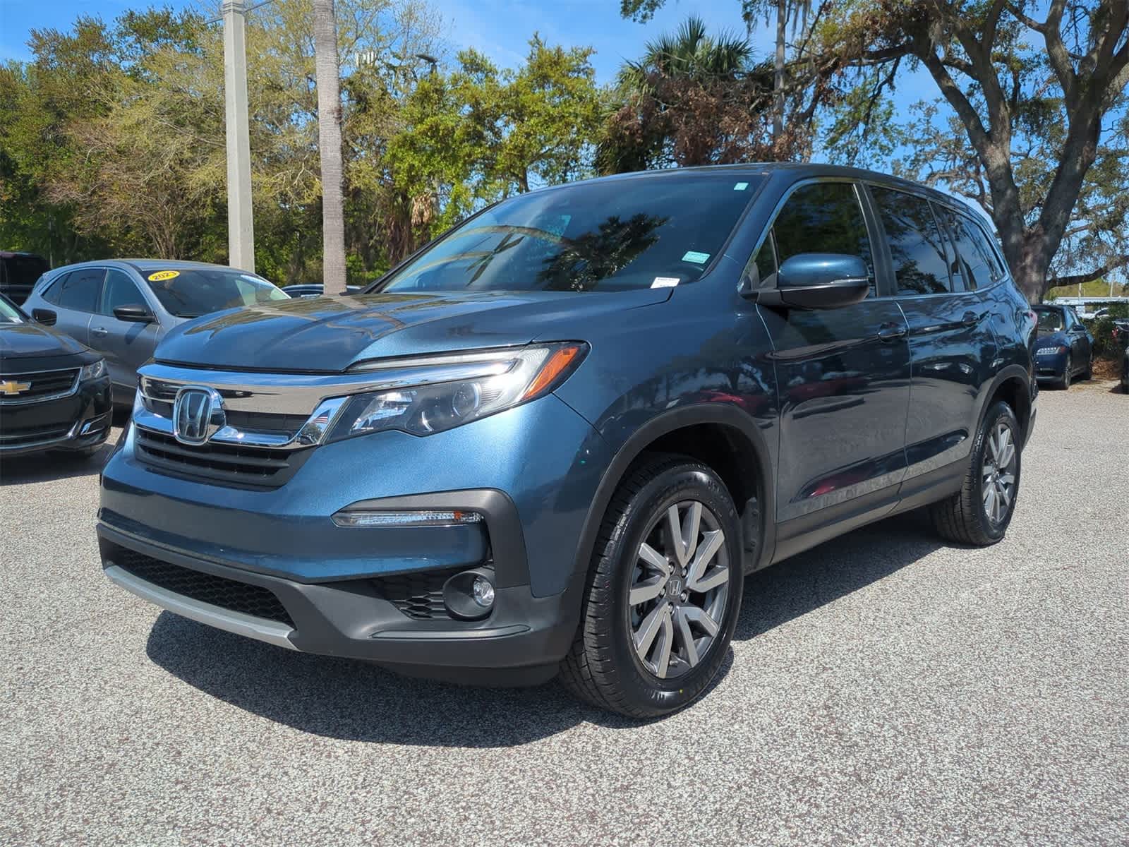 Certified 2022 Honda Pilot EX-L with VIN 5FNYF6H57NB007637 for sale in Tampa, FL