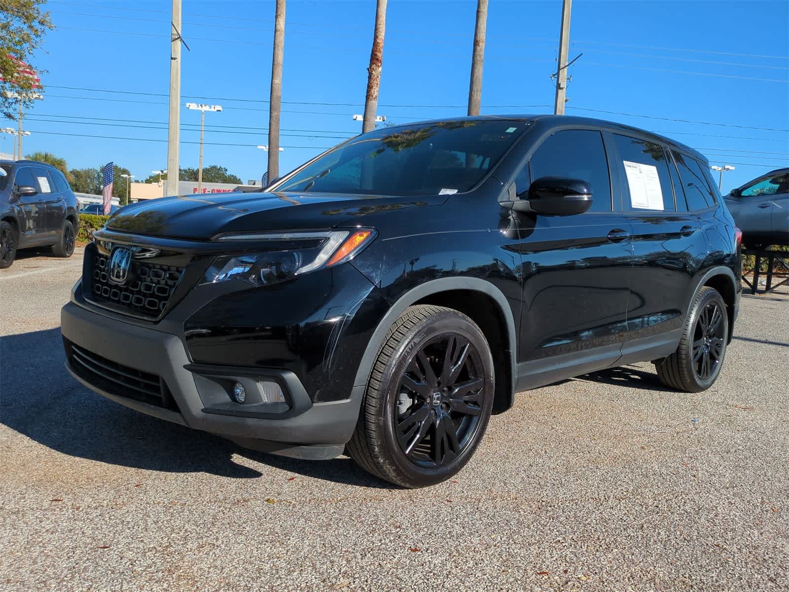 Used 2021 Honda Passport EX-L with VIN 5FNYF7H56MB015524 for sale in Tampa, FL