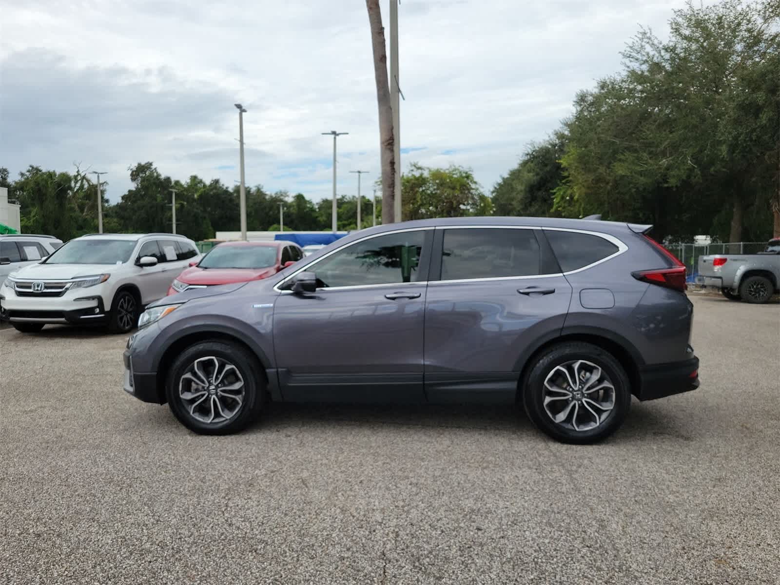 Used 2022 Honda CR-V EX-L with VIN 5J6RT6H85NL043633 for sale in Tampa, FL