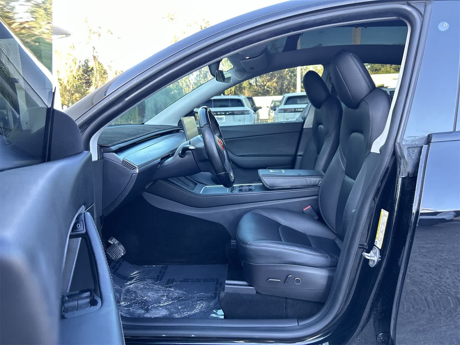 Used 2021 Tesla Model Y Long Range with VIN 5YJYGAEE7MF188371 for sale in Tampa, FL