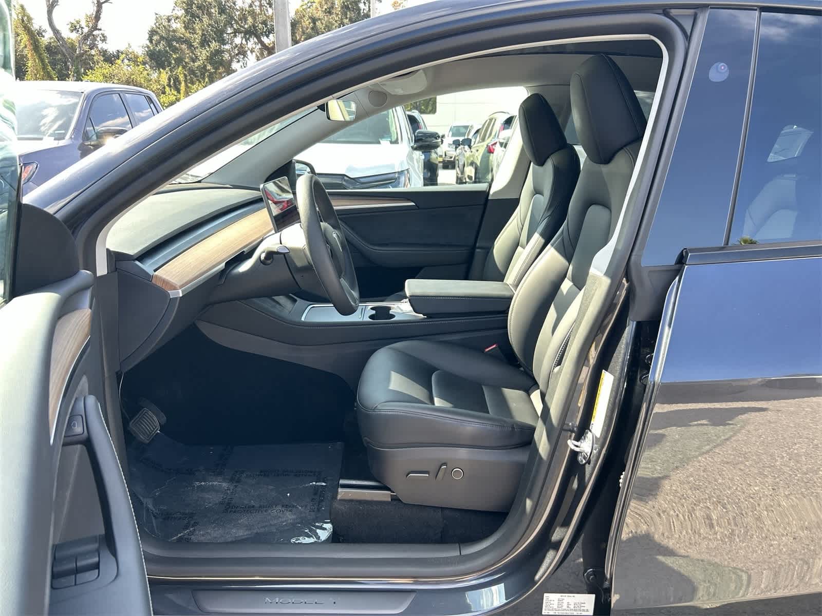 Used 2025 Tesla Model Y Long Range with VIN 7SAYGDED9SA373253 for sale in Northfield, Minnesota