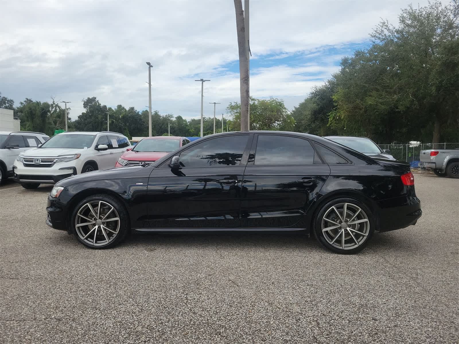 Used 2016 Audi A4 Premium with VIN WAUAFAFL0GA007106 for sale in Tampa, FL