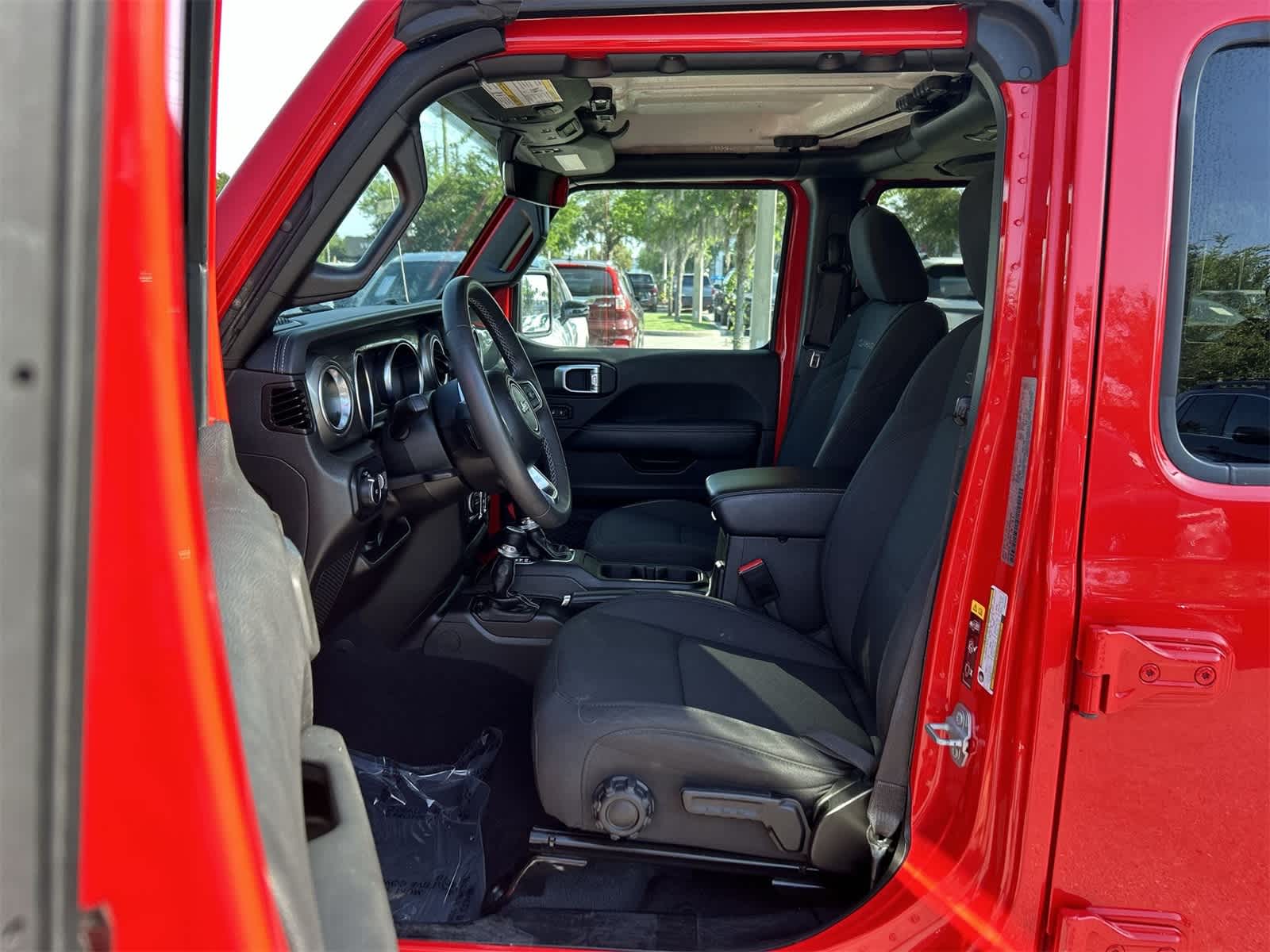 Used 2023 Jeep Wrangler 4-Door Sahara with VIN 1C4HJXEN2PW595504 for sale in Wesley Chapel, FL