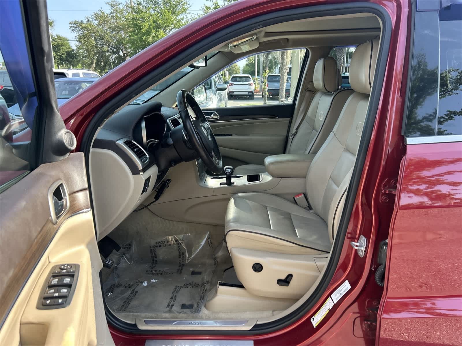 Used 2014 Jeep Grand Cherokee Overland with VIN 1C4RJECT4EC239760 for sale in Wesley Chapel, FL