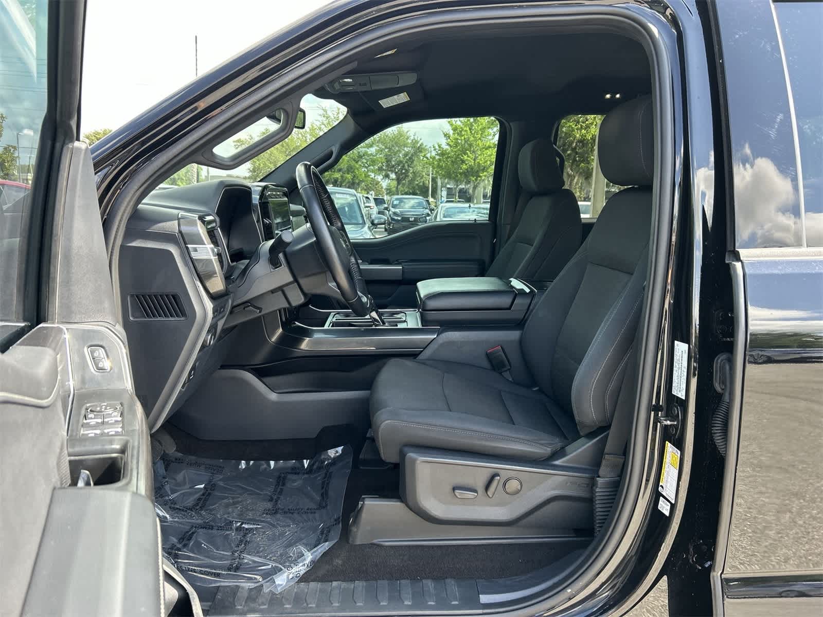 Used 2022 Ford F-150 XLT with VIN 1FTFW1E55NFC37932 for sale in Wesley Chapel, FL