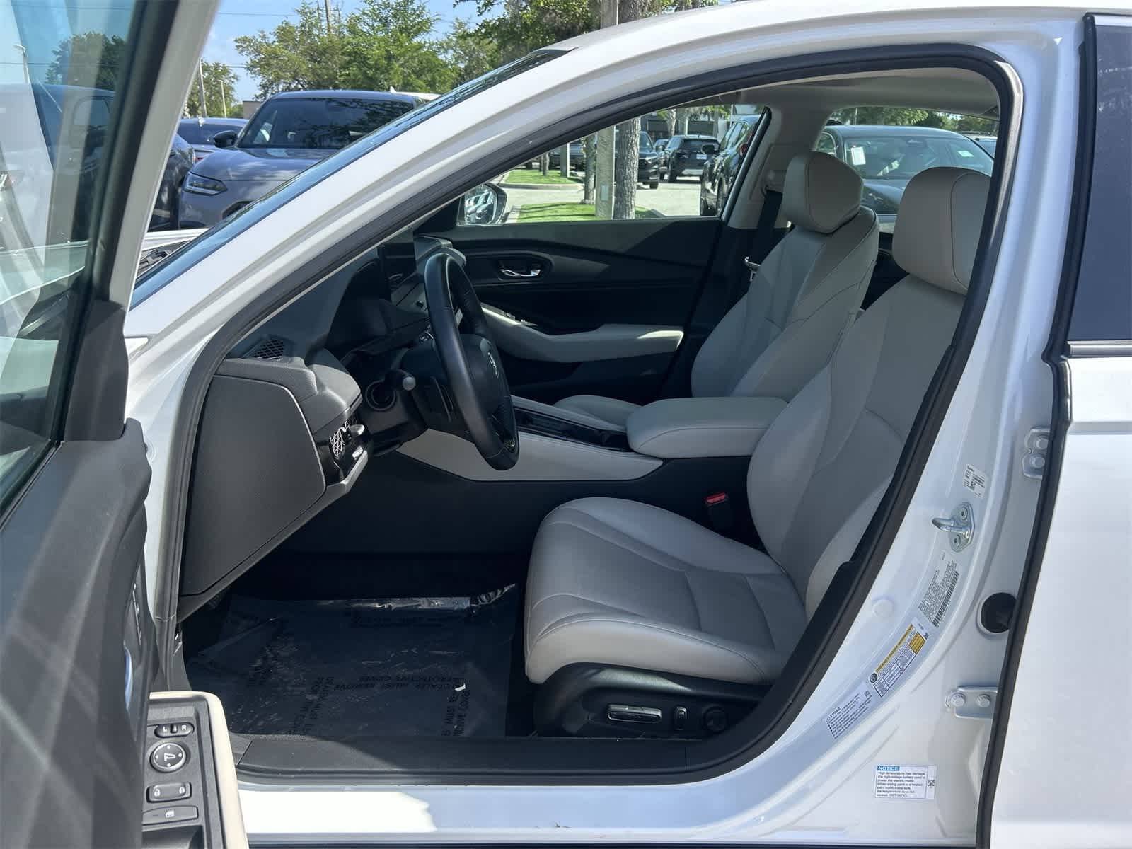 Used 2023 Honda Accord Hybrid EX-L with VIN 1HGCY2F66PA058648 for sale in Wesley Chapel, FL