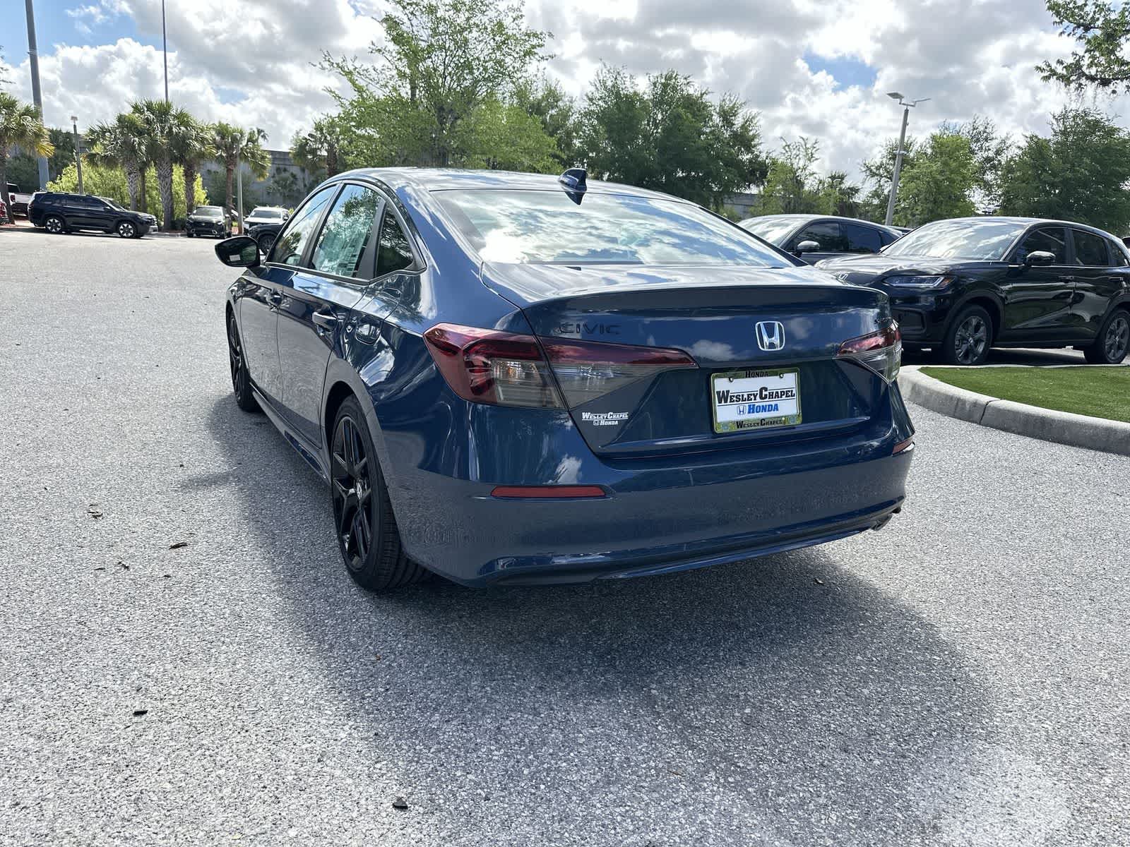 View vehicle photo 4