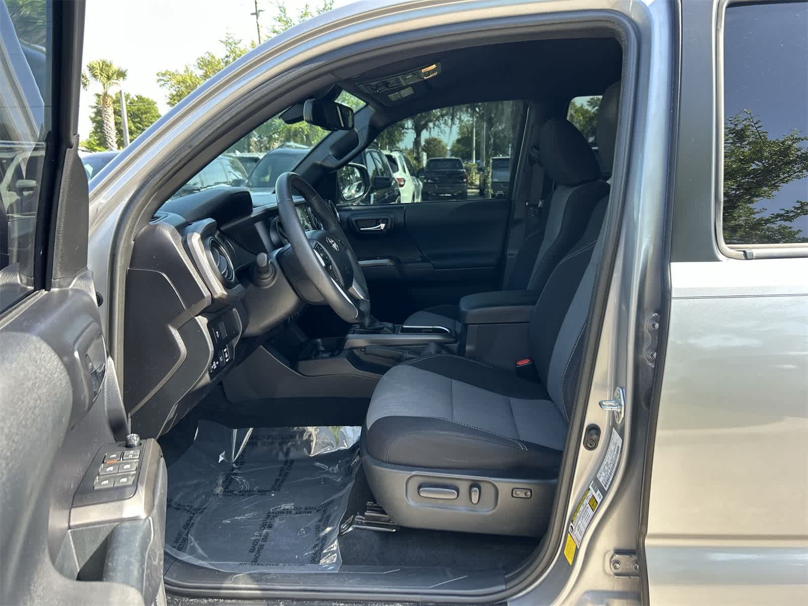 Used 2021 Toyota Tacoma TRD Off Road with VIN 3TMCZ5AN5MM395015 for sale in Wesley Chapel, FL