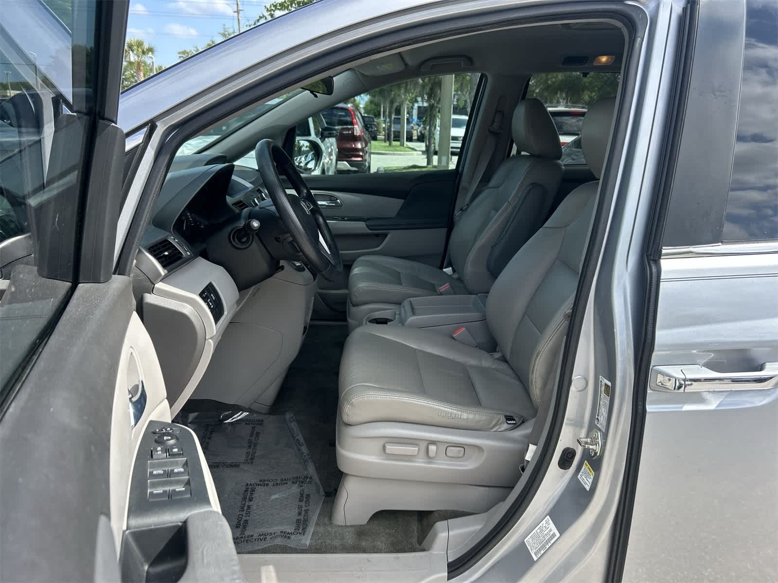 Used 2016 Honda Odyssey SE with VIN 5FNRL5H39GB082946 for sale in Wesley Chapel, FL