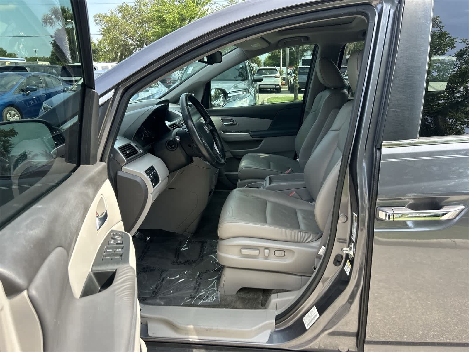 Used 2015 Honda Odyssey EX-L with VIN 5FNRL5H63FB010942 for sale in Wesley Chapel, FL