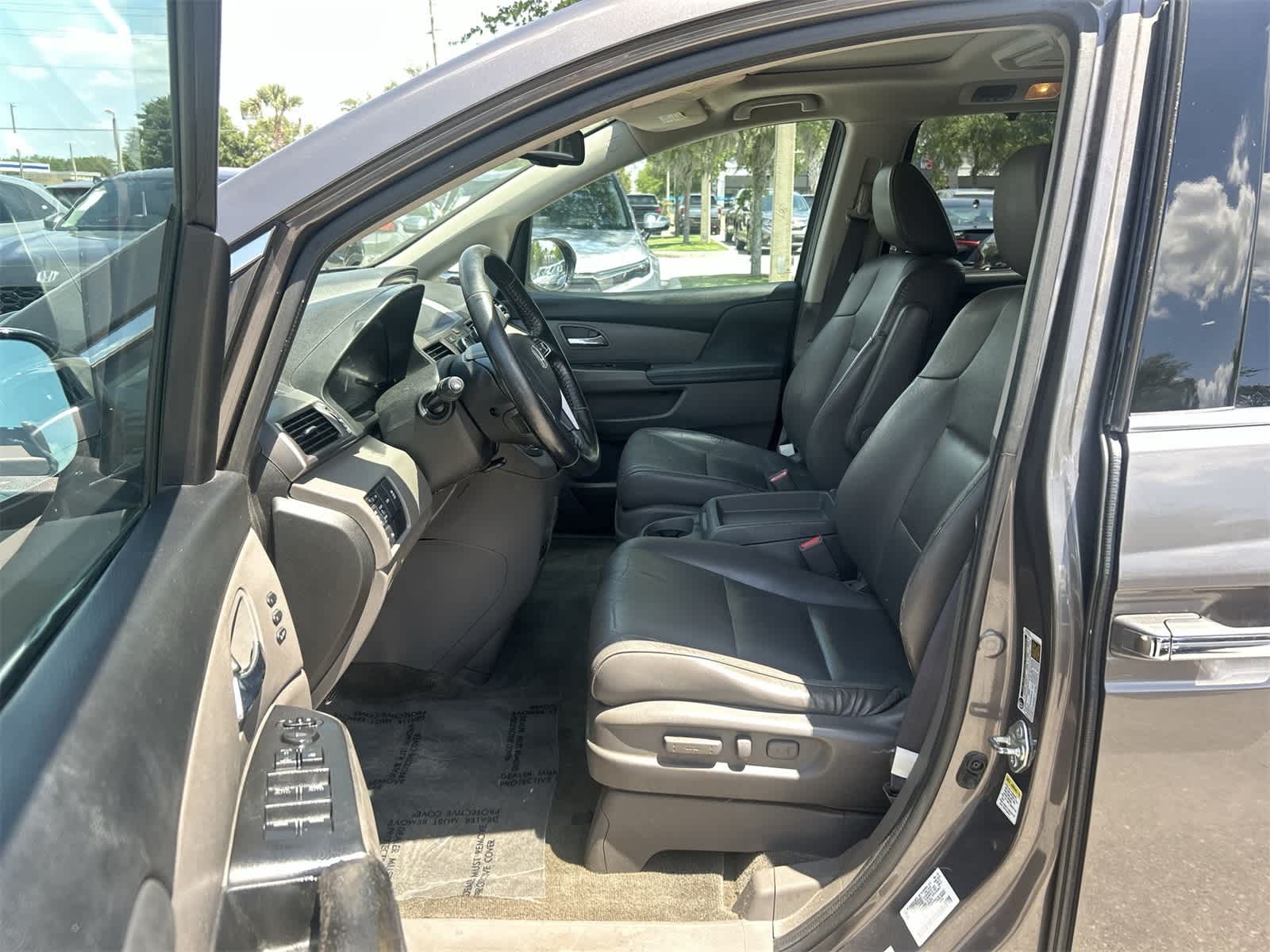 Used 2015 Honda Odyssey Touring with VIN 5FNRL5H96FB108454 for sale in Wesley Chapel, FL