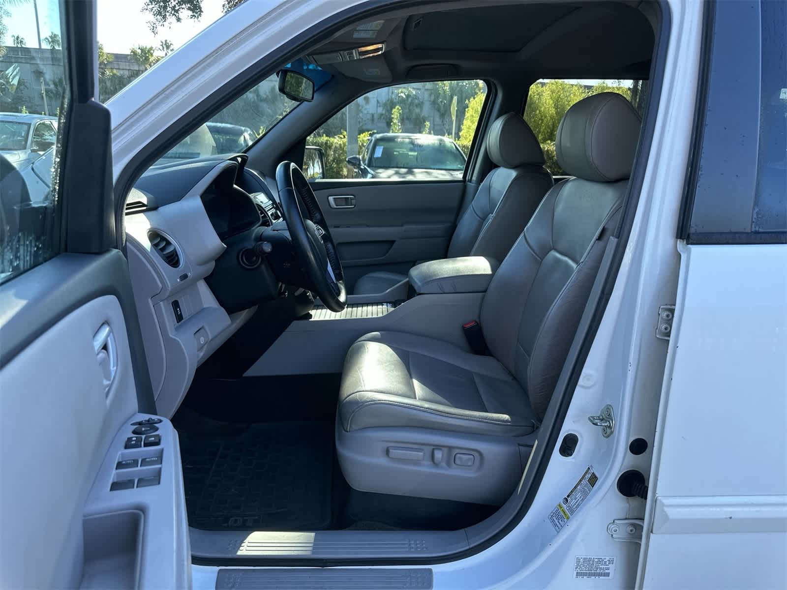 Used 2014 Honda Pilot EX-L with VIN 5FNYF4H59EB013489 for sale in Wesley Chapel, FL