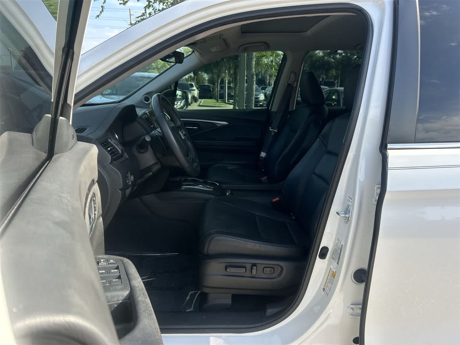 Used 2022 Honda Pilot SE with VIN 5FNYF5H21NB025471 for sale in Wesley Chapel, FL