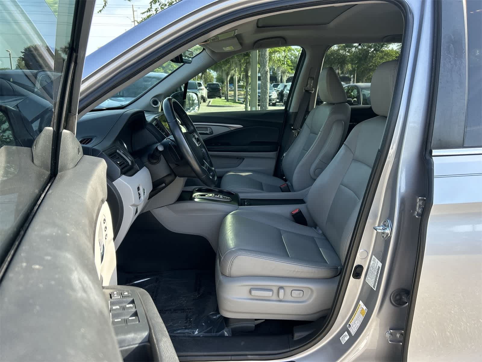 Used 2022 Honda Pilot EX-L with VIN 5FNYF5H51NB013069 for sale in Wesley Chapel, FL