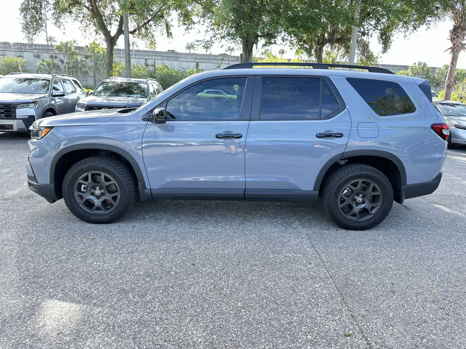 View vehicle photo 3