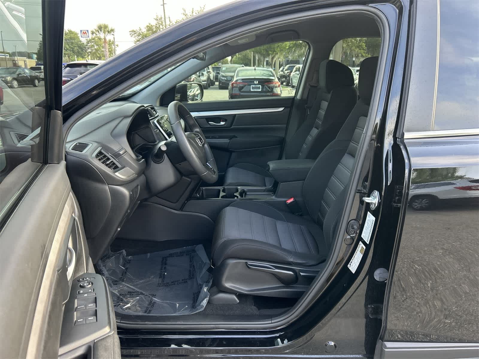 Used 2021 Honda CR-V LX with VIN 5J6RW1H21MA001735 for sale in Wesley Chapel, FL
