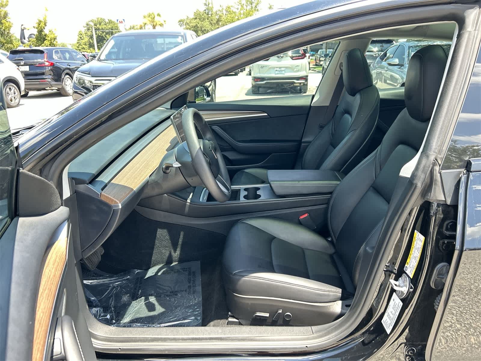 Used 2023 Tesla Model 3 Base with VIN 5YJ3E1EA5PF601583 for sale in Wesley Chapel, FL