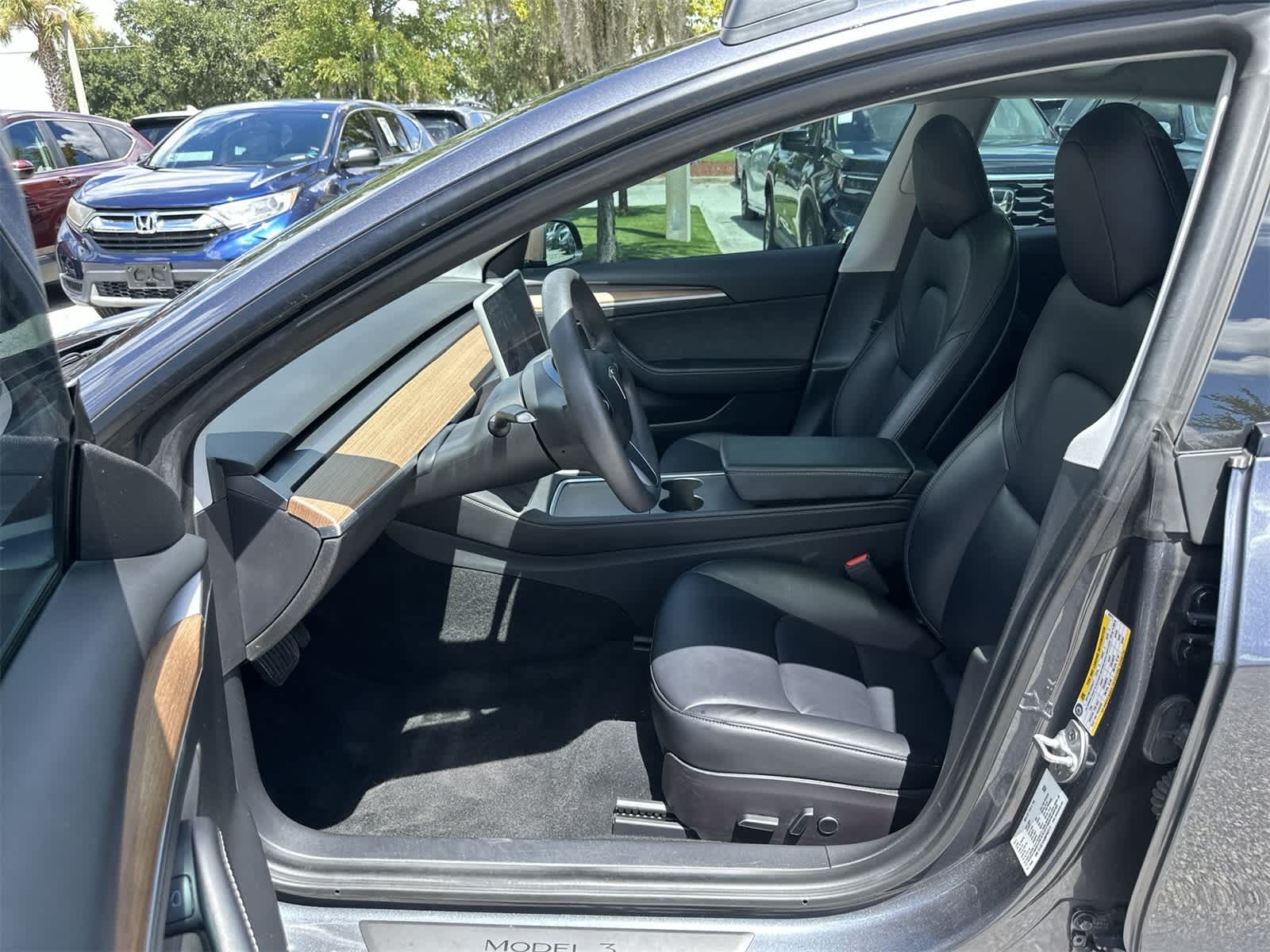 Used 2021 Tesla Model 3 Base with VIN 5YJ3E1EA8MF053171 for sale in Wesley Chapel, FL