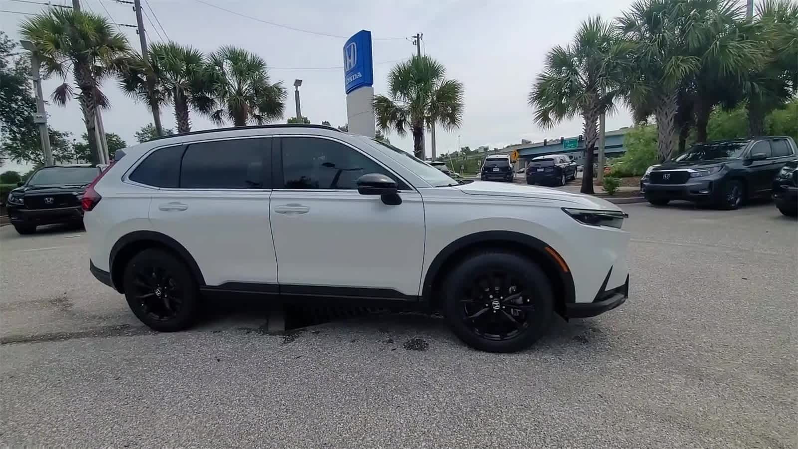 Used 2023 Honda CR-V Sport with VIN 7FARS6H55PE031037 for sale in Wesley Chapel, FL