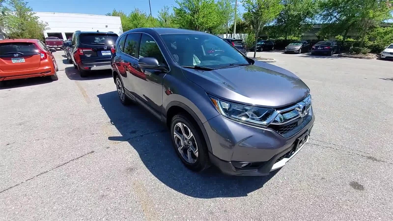Used 2019 Honda CR-V EX-L with VIN 7FARW2H82KE023641 for sale in Wesley Chapel, FL