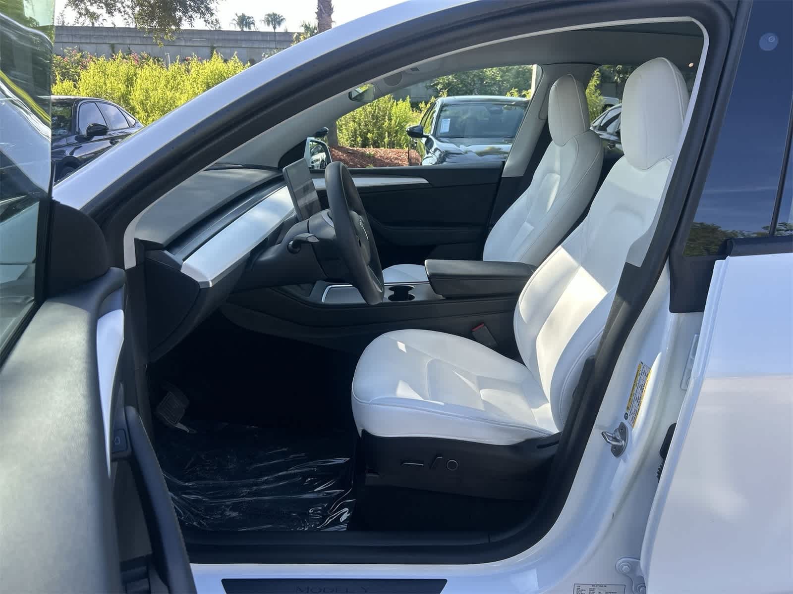 Used 2023 Tesla Model Y Long Range with VIN 7SAYGAEE0PF599506 for sale in Northfield, Minnesota