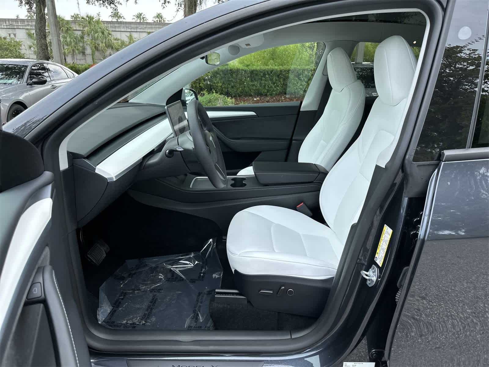 Used 2024 Tesla Model Y Long Range with VIN 7SAYGDEE6RA328712 for sale in Northfield, Minnesota