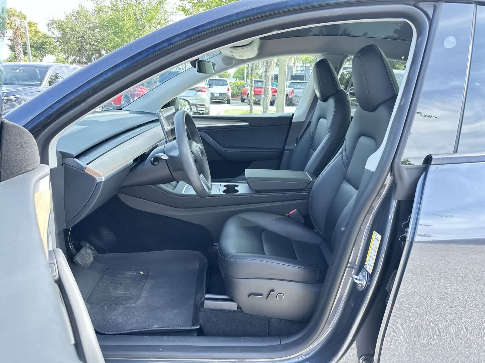 Used 2023 Tesla Model Y Long Range with VIN 7SAYGDEEXPA199533 for sale in Wesley Chapel, FL