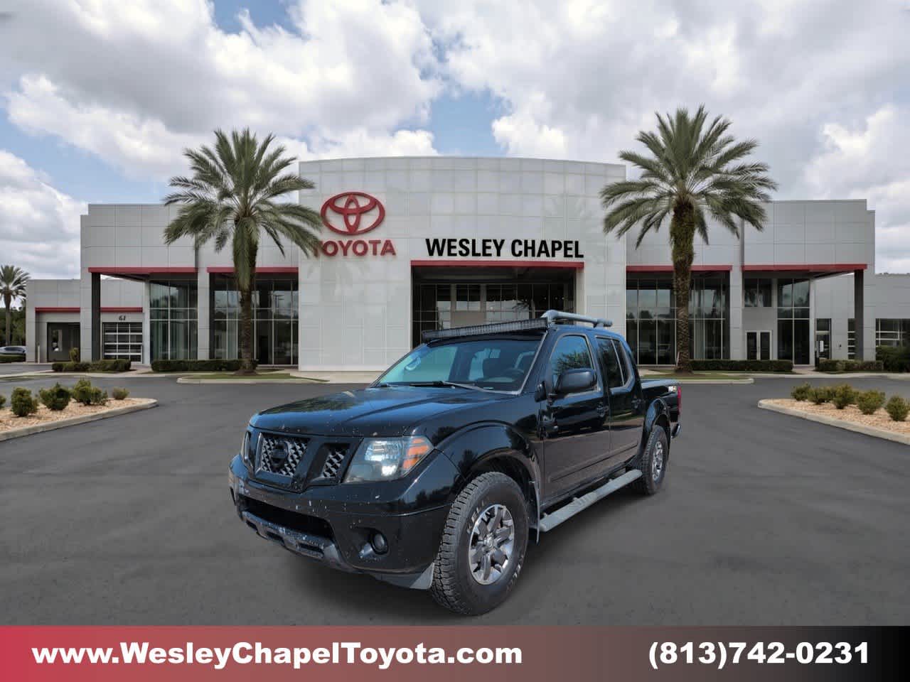 Black 2014 Nissan Frontier Pickup Truck Four-Wheel Drive Automatic