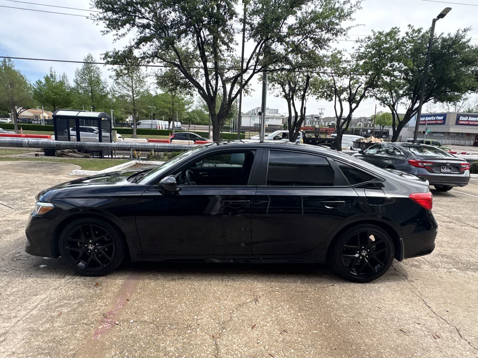 View vehicle photo 3