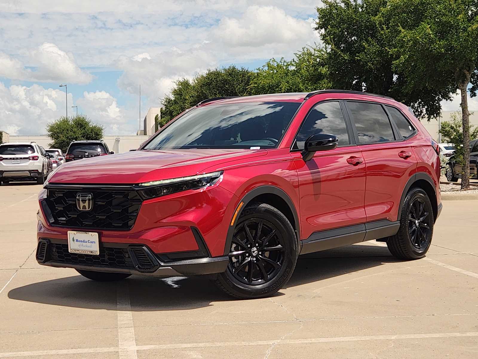 Radiant Red Metallic 2026 Honda CR-V Hybrid SUV / Crossover Front-Wheel Drive Continuously Variable Transmission