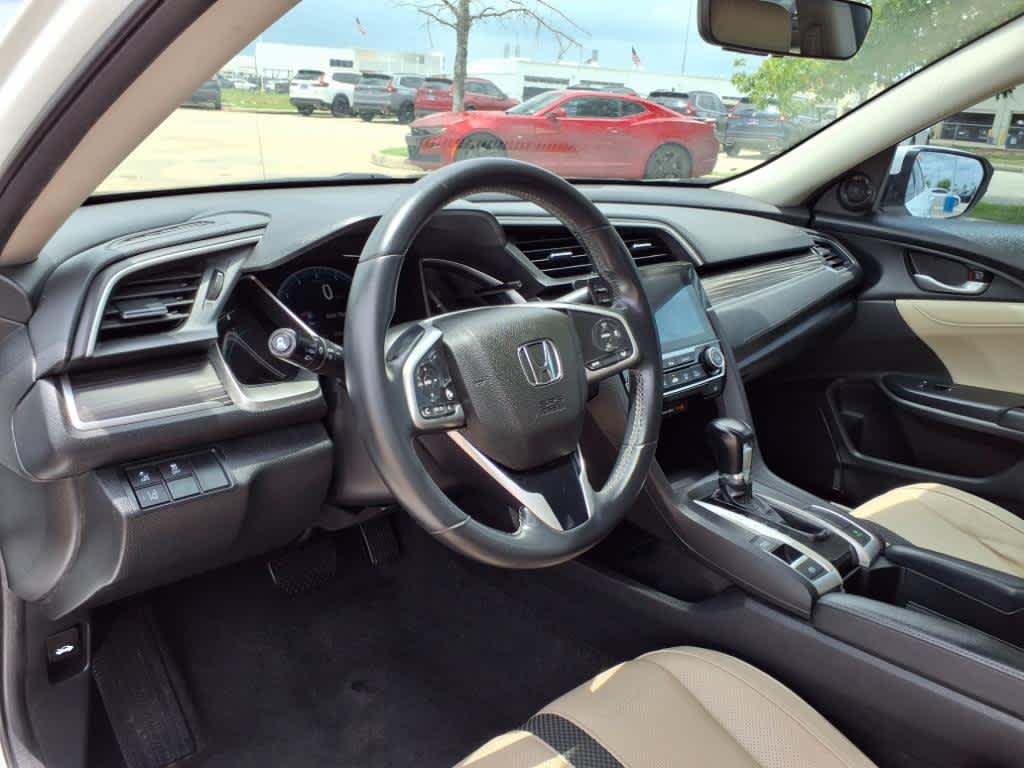 Certified 2021 Honda Civic EX-L with VIN 19XFC1F7XME002492 for sale in Katy, TX