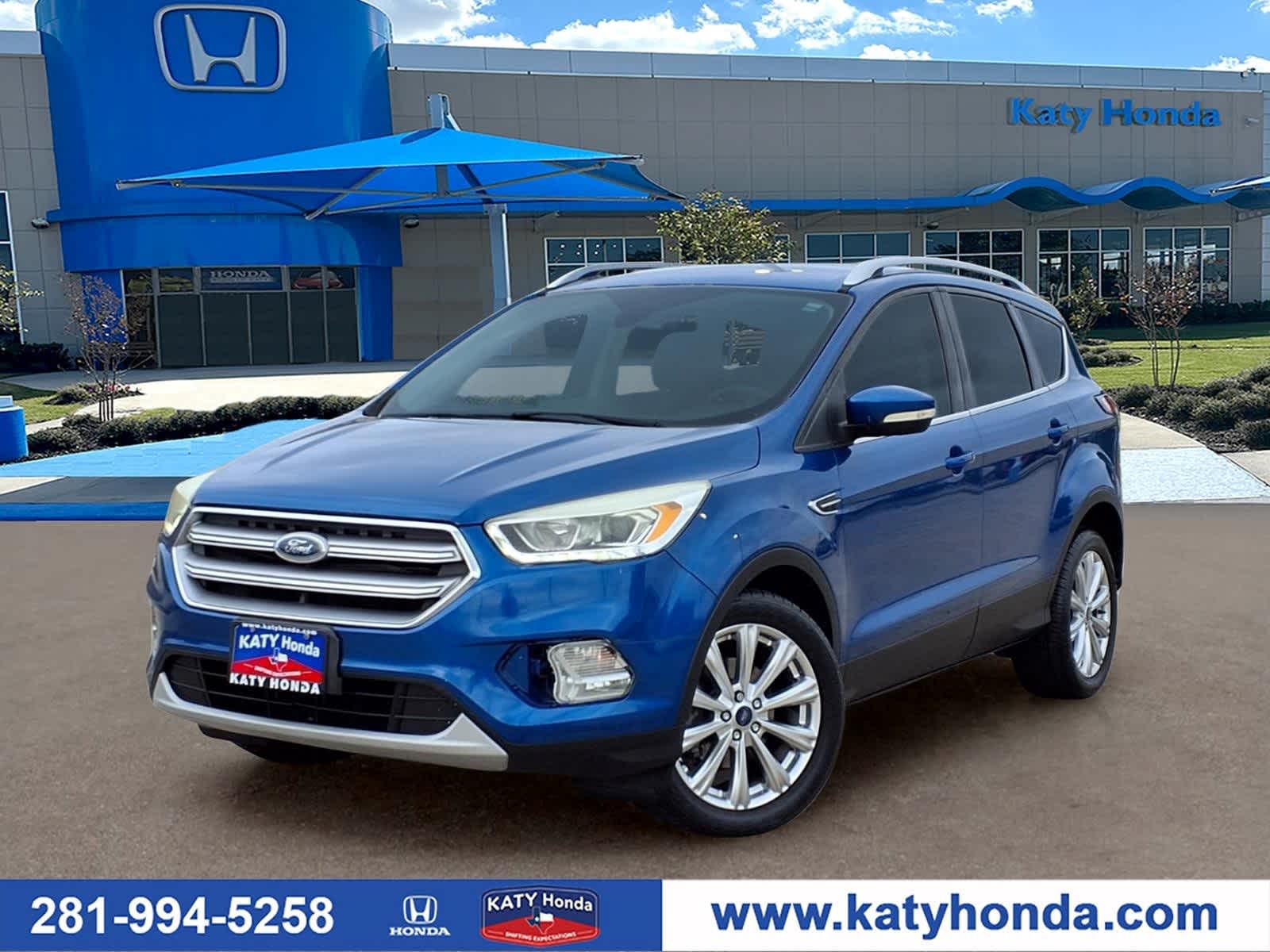 Lightning Blue Metallic 2017 Ford Escape Titanium FWD SUV / Crossover Front-Wheel Drive 6-Speed Automatic