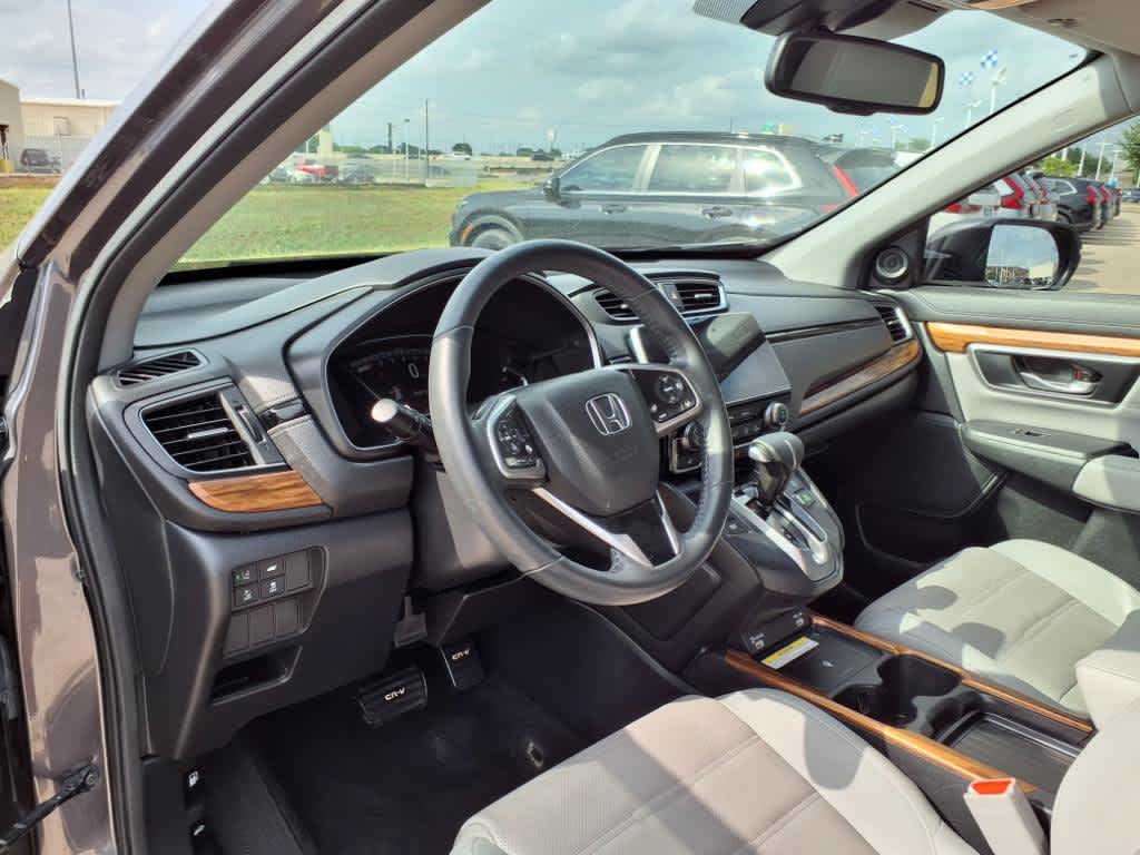 Used 2020 Honda CR-V Touring with VIN 5J6RW1H90LL011799 for sale in Katy, TX