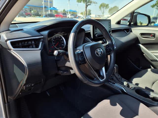 Used 2022 Toyota Corolla Cross LE with VIN 7MUCAAAG1NV010011 for sale in Katy, TX