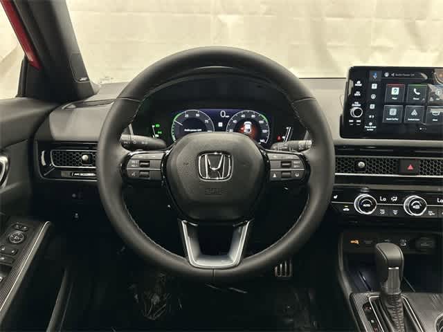 2026 Honda Civic Hatchback Hybrid Sport Touring Rallye Red at Honda of Clear Lake