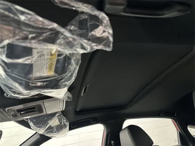 2026 Honda Civic Hatchback Hybrid Sport Touring Rallye Red at Honda of Clear Lake