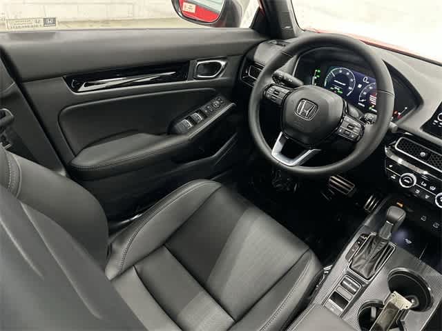 2026 Honda Civic Hatchback Hybrid Sport Touring Rallye Red at Honda of Clear Lake