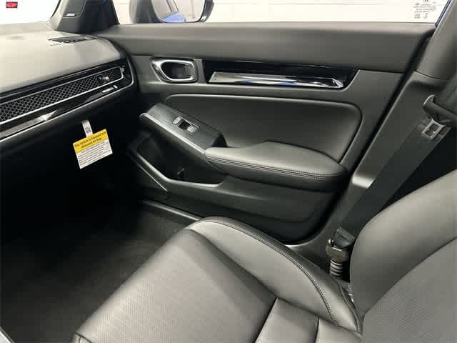 2026 Honda Civic Hatchback Hybrid Sport Touring Boost Blue Pearl at Honda of Clear Lake