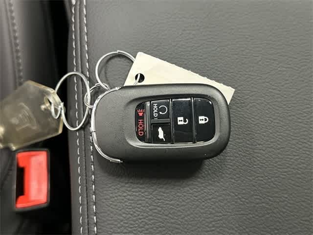 2026 Honda Civic Hatchback Hybrid Sport Touring Rallye Red at Honda of Clear Lake