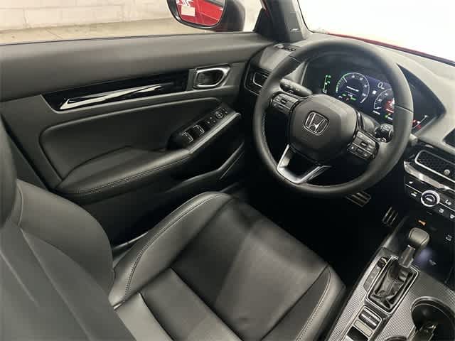 2026 Honda Civic Hatchback Hybrid Sport Touring Rallye Red at Honda of Clear Lake