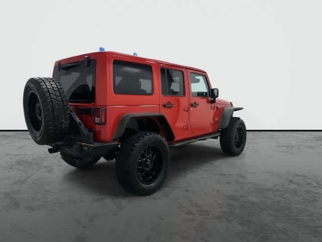 2017 Jeep Wrangler Unlimited Sahara Firecracker Red Clearcoat at Lexus of Clear Lake