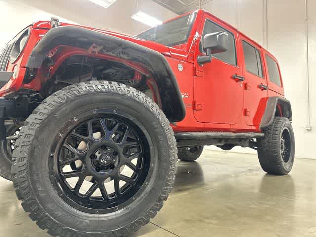 2017 Jeep Wrangler Unlimited Sahara Firecracker Red Clearcoat at Lexus of Clear Lake