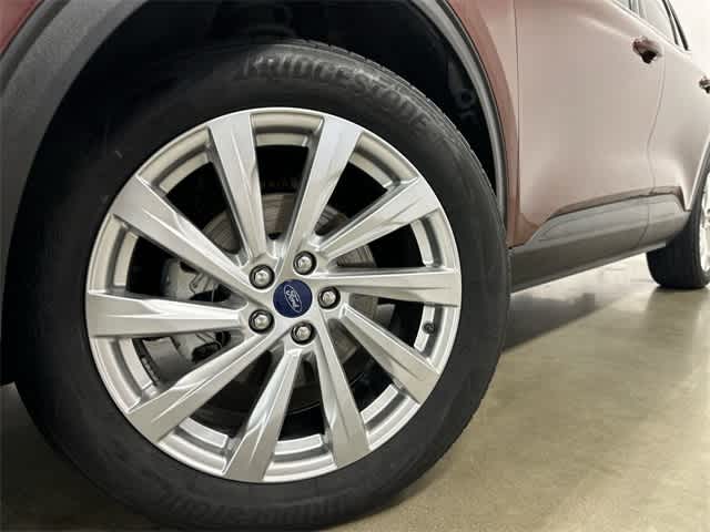 2021 Ford Escape Titanium Hybrid Bronze Fire Metallic at Friendly Ford Crosby