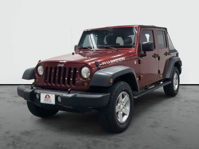 2011 Jeep Wrangler Unlimited Rubicon Deep Cherry Red Crystal Pearl Coat at Group 1 Toyota Southwest