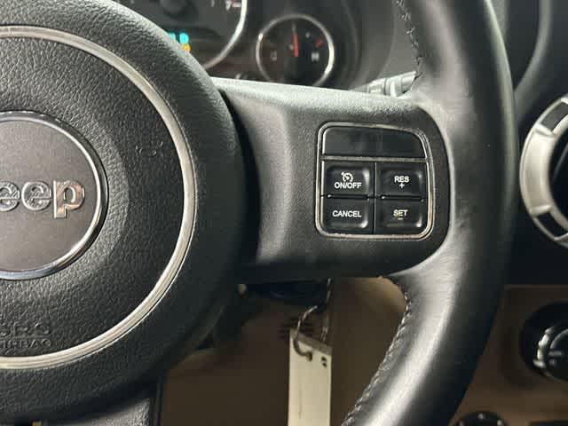 2011 Jeep Wrangler Unlimited Rubicon Deep Cherry Red Crystal Pearl Coat at Group 1 Toyota Southwest