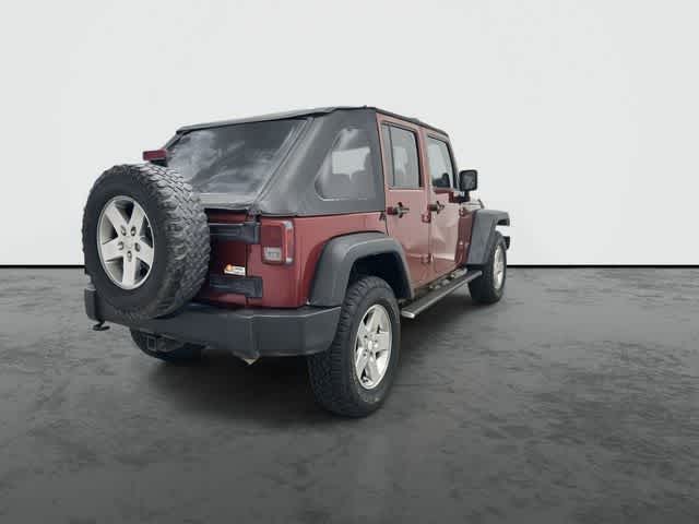 2011 Jeep Wrangler Unlimited Rubicon Deep Cherry Red Crystal Pearl Coat at Group 1 Toyota Southwest