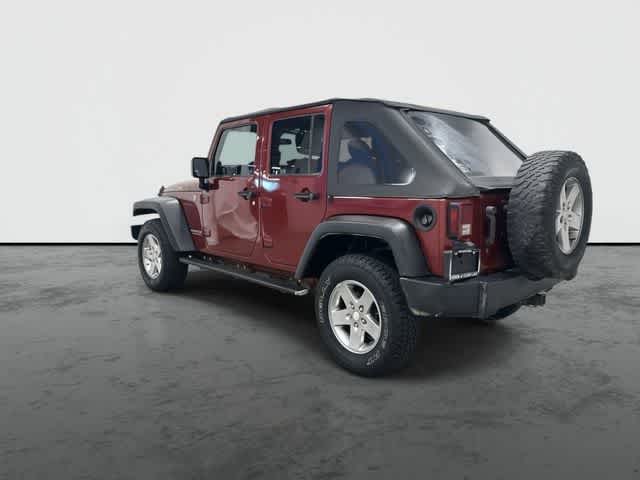 2011 Jeep Wrangler Unlimited Rubicon Deep Cherry Red Crystal Pearl Coat at Group 1 Toyota Southwest