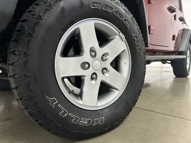 2011 Jeep Wrangler Unlimited Rubicon Deep Cherry Red Crystal Pearl Coat at Group 1 Toyota Southwest